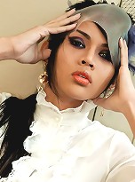 Infamous hung ladyboy wanks in party dress