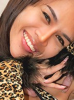 Hung tranny curls up in a leopard teddy and gloves