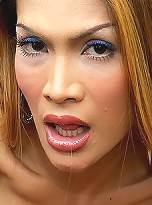 Tan Asian ladyboy shoots a load from his cock