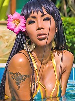 Pretty t-girl teases her long cock in the pool