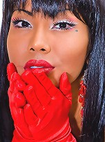 Drop dead gorgeous tranny Areeya poses and bends over in the bed