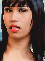 Kinky Asian ladyboy plays with her hardon