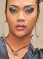 Dark exotic ladyboy unloads creamy white spunk